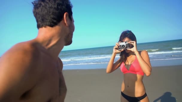  female taking a photo of male - Footage, Video