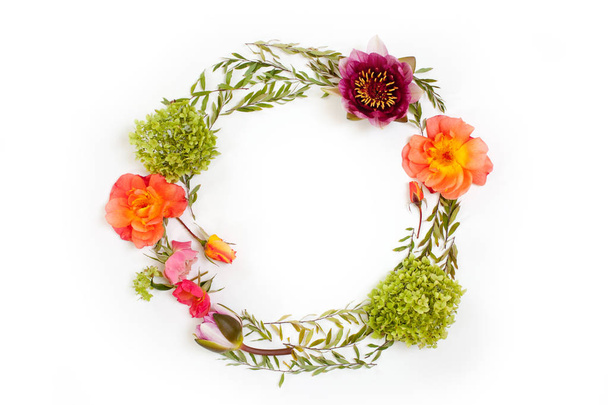 Floral round crown (wreath) with flowers and leaves. Flat lay - Fotoğraf, Görsel