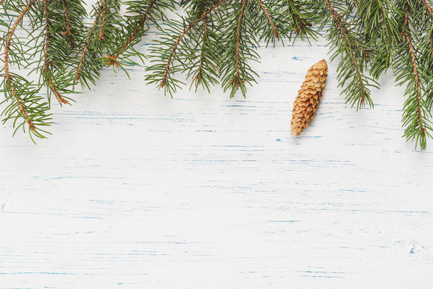 Christmas wooden background with fir branches - Photo, Image
