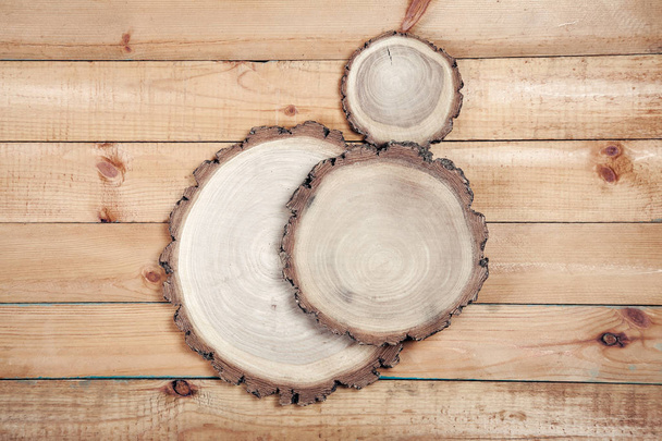 Circle boards on wooden table - Foto, Bild