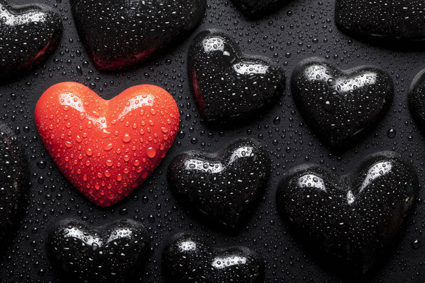 Water drops on red and black hearts - Photo, Image