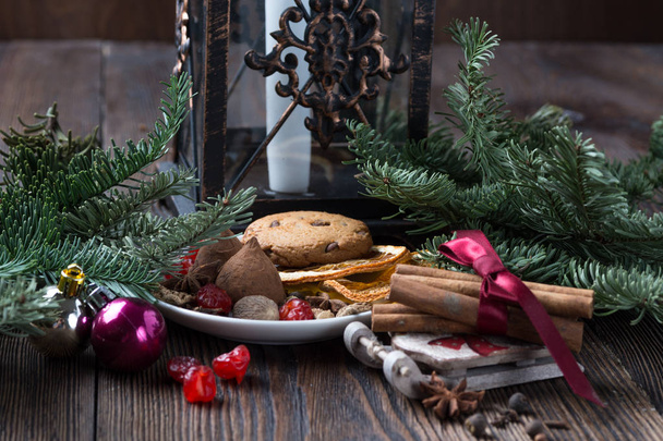 Christmas still life with traditional fir on wood - Фото, изображение