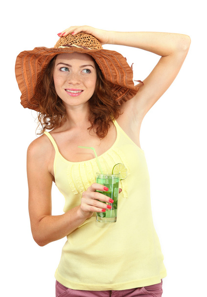 Smiling beautiful girl with beach hat and cocktail isolated on white - Photo, image