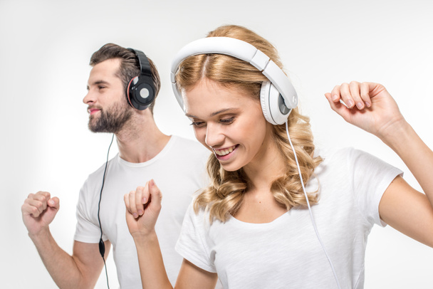 Young couple in headphones - Photo, Image