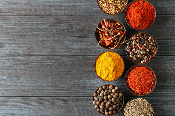 Different spices in bowls - Фото, зображення