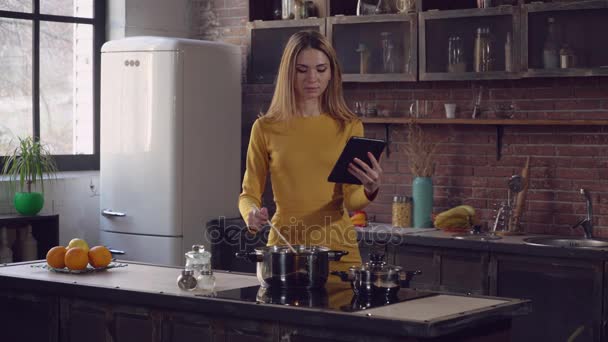 Female cook lunch for family. - Materiał filmowy, wideo