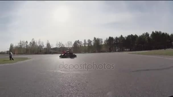 Clash of karting. Camera on a kartmoving and hitting another kart. Go-kart track. - Footage, Video