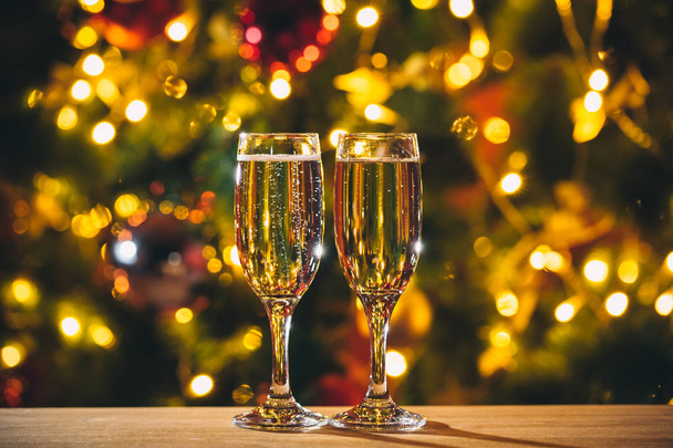 Two glasses of champagne on blurred background - Photo, Image