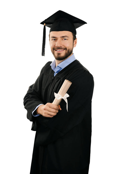 happy smiling male graduate with diploma isolated on white - Photo, Image