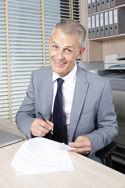 happy businessman sign a contract - Photo, Image