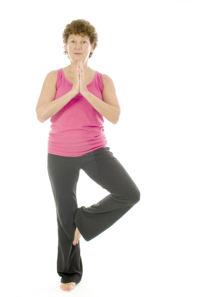 pose de yoga de fitness de mujer mayor de mediana edad
 - Foto, Imagen