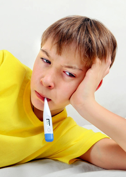 Sick Kid with Thermometer - Photo, Image