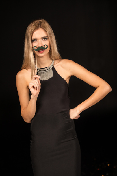 Gorgeous woman with fake mustache  - 写真・画像