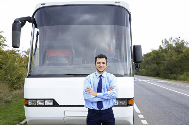Driver in front of bus - Photo, image