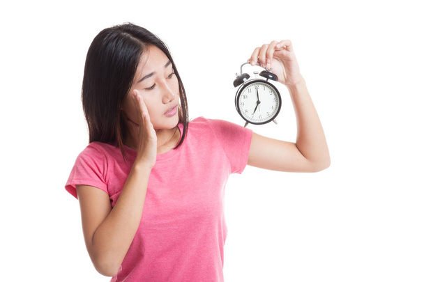 Young Asian woman is  stressed with a clock. - Zdjęcie, obraz