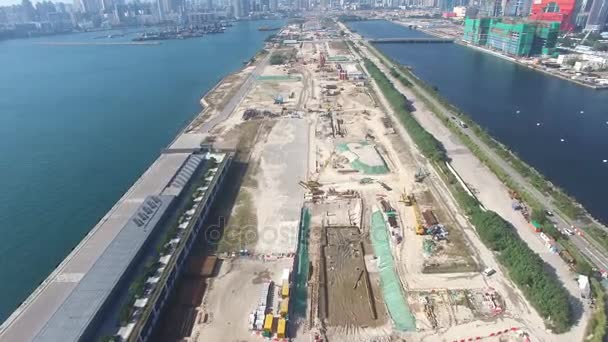 A légi felvétel a régi Hong Kong Kai Tak repülőtéri kifutópályára válik egy építkezésen - Felvétel, videó
