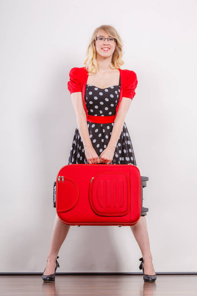 Elegant fashion woman with red suitcase - Φωτογραφία, εικόνα