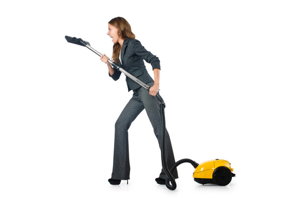 zakenvrouw reinigen met een stofzuiger - Foto, afbeelding