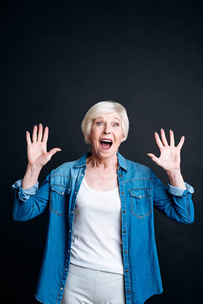 Delighted elderly woman expressing joy - Zdjęcie, obraz