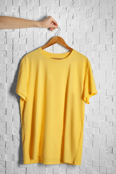 Blank yellow t-shirt - Fotoğraf, Görsel