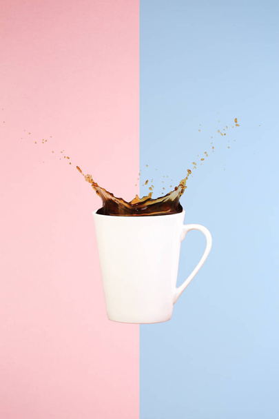 Coffee concept. Minimal art. Solid background. Coffee splashes.  - Photo, Image