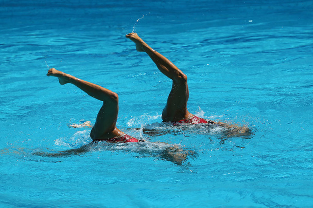 Synchronized swimming duet during competition - Photo, Image