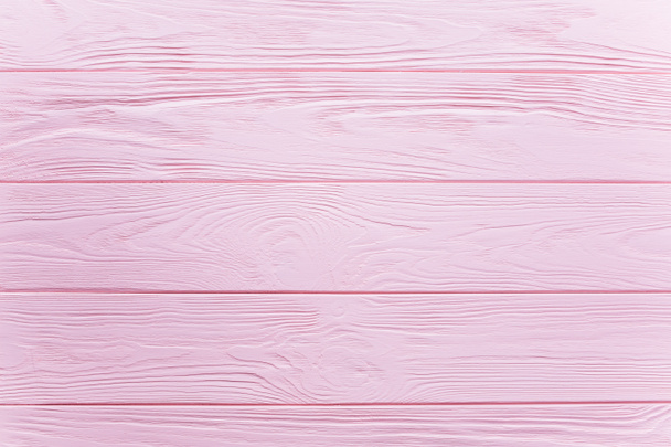 różowy drewniany stół - Zdjęcie, obraz