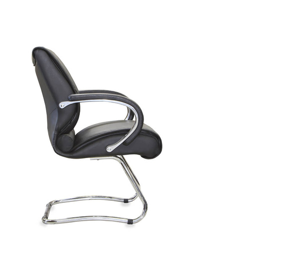 The office chair from black leather. Isolated - Fotó, kép