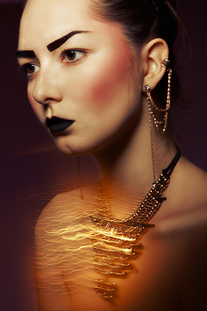 Baroque woman with golden accessories - Foto, immagini