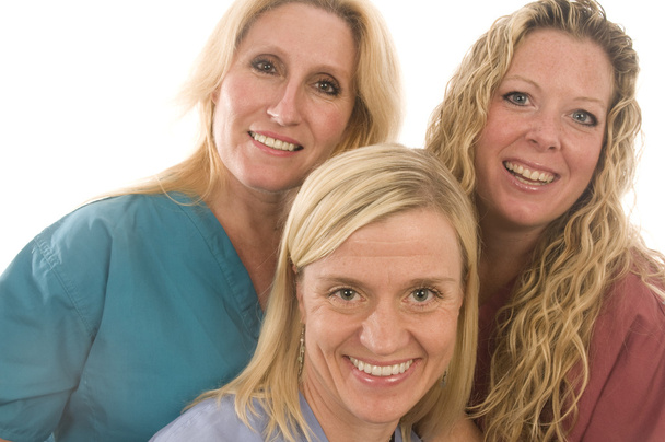 trzy pielęgniarki medycznej kobiety z wyrażenie zadowolony - Zdjęcie, obraz