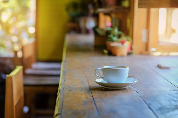 Coffee white mug on wooden table. - Foto, immagini