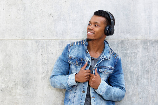 Man listening music in headphones - Фото, зображення