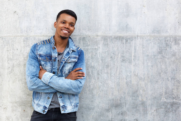 Close up portrait of handsome young black man smiling - Photo, Image