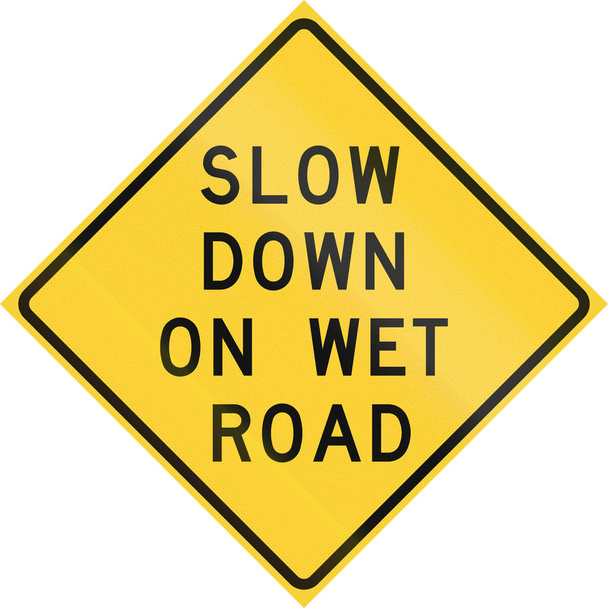 Πινακίδα που χρησιμοποιείται στις ΗΠΑ πολιτεία του Τέξας - επιβραδύνει σε βρεγμένο δρόμο - Φωτογραφία, εικόνα