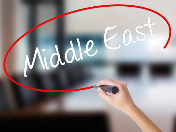 Woman Hand Writing Middle East with a marker over transparent bo - Photo, Image
