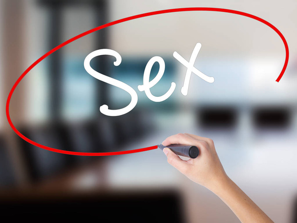 Woman Hand Writing Sex with a marker over transparent board - Photo, Image