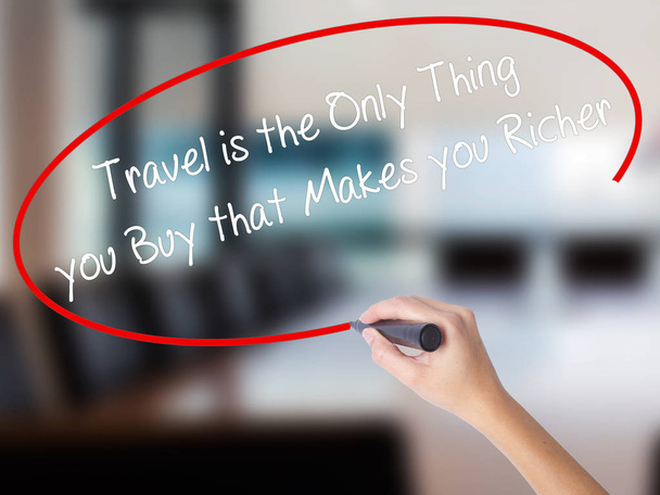 Woman Hand Writing Travel is the Only Thing you Buy that Makes y - Fotoğraf, Görsel