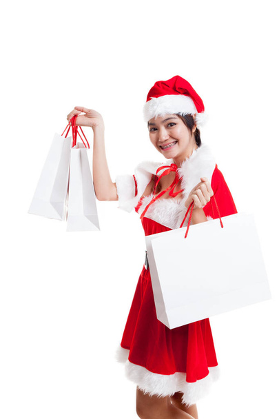 Asian Christmas Santa Claus girl with shopping bags. - Zdjęcie, obraz