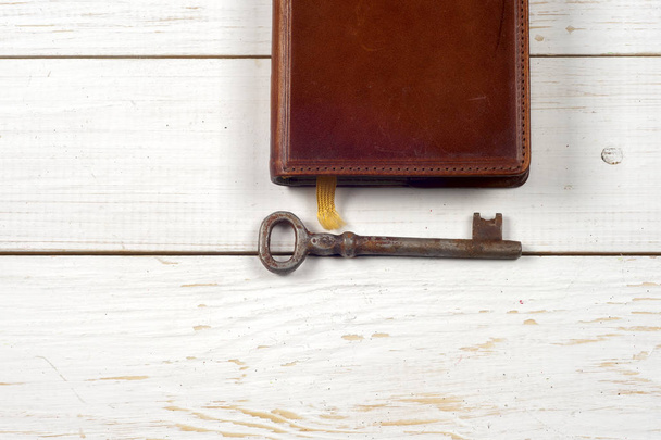 old keys on book, antique wood background - Photo, Image