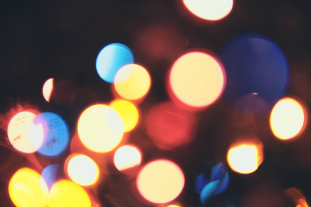Christmas multicolor bokeh.Background with  defocused lights. - Photo, image