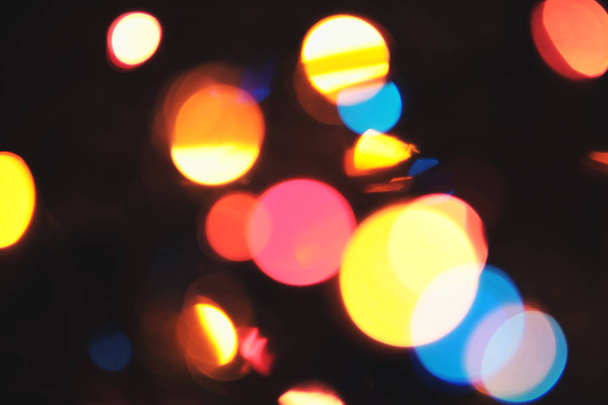 Christmas multicolor bokeh.Background with  defocused lights. - Fotografie, Obrázek