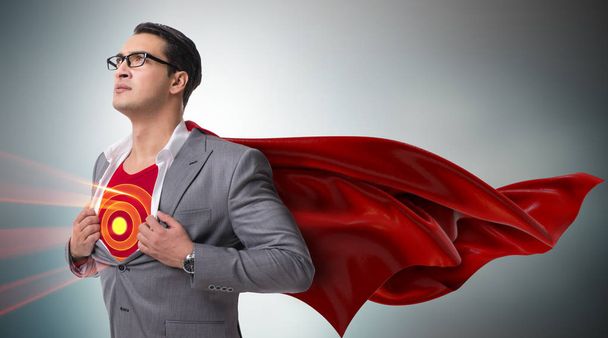 Uomo d'affari nel concetto di supereroe con copertina rossa
 - Foto, immagini