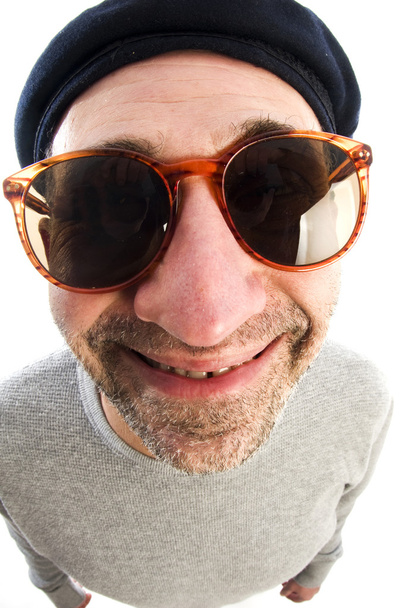 ikääntyminen taiteilija ajattelu vääristynyt nenä lähikuva baskeri hattu
 - Valokuva, kuva