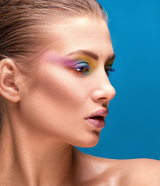 Young girl in colorful makeup. - Photo, image