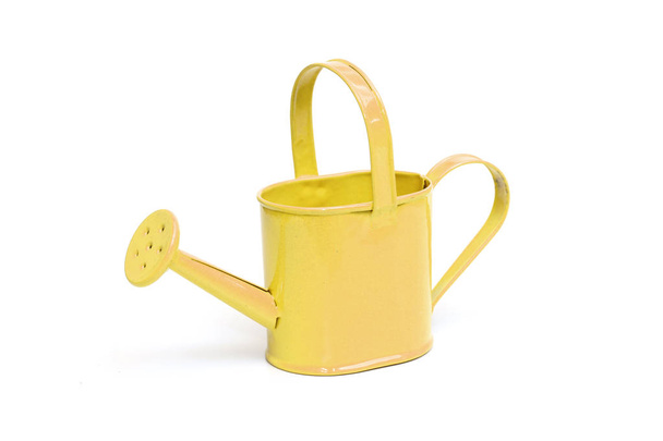 Arrosoir jaune
 - Photo, image