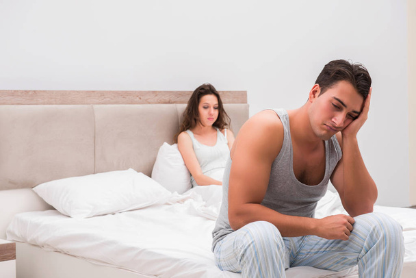 Family conflict with wife and husband in bed - Photo, Image