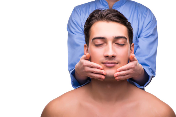 Man during massage session isolated on white - Photo, image