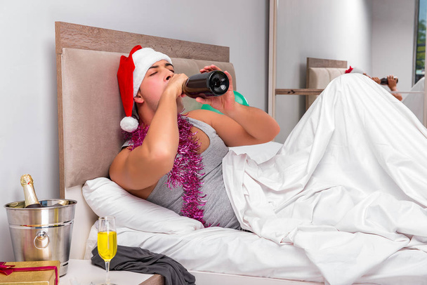Young man having hangover after heavy partying - Photo, Image