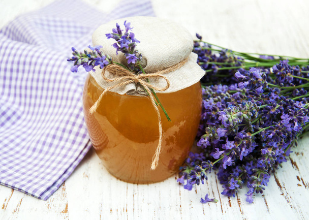 Honey and lavender flowers - Photo, image
