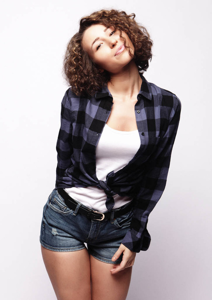 lifestyle and people concept:Young happy woman with curly hair - Foto, Imagem